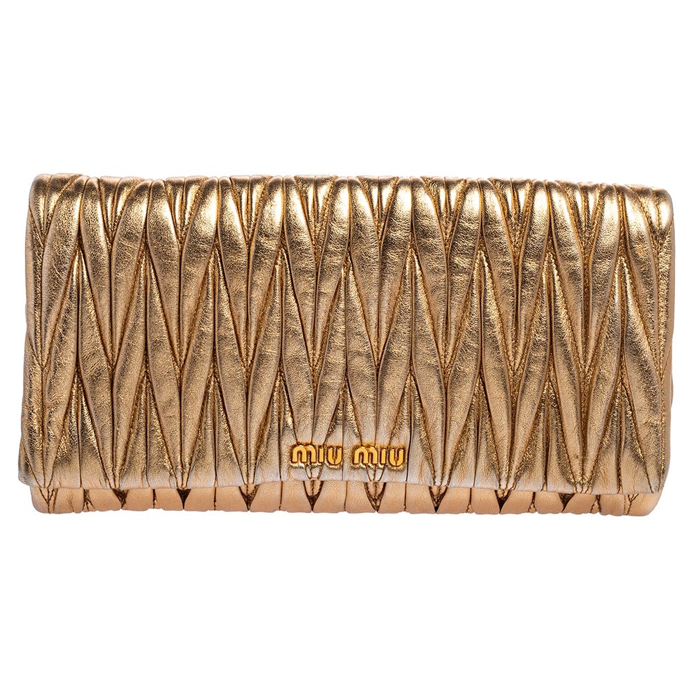 miu miu gold clutch