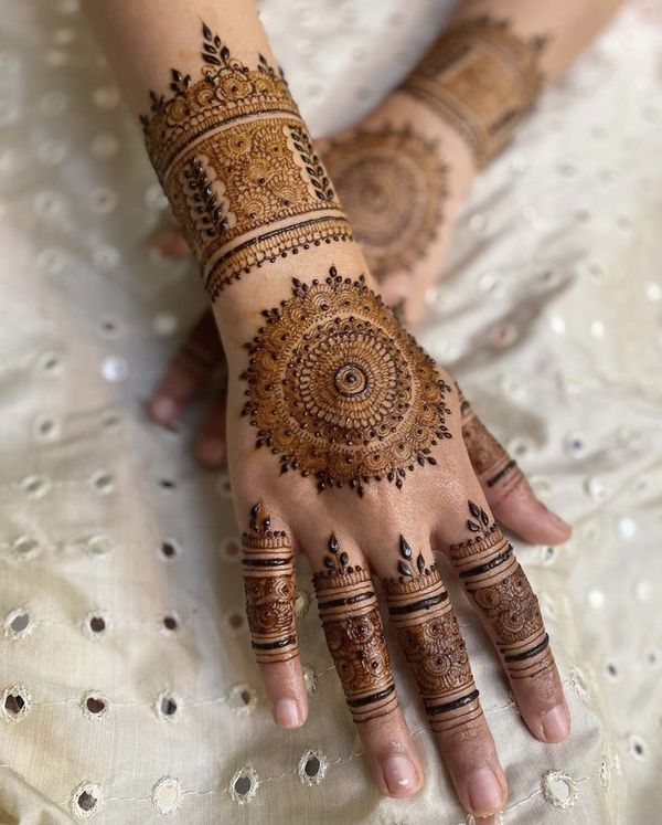 mehndi design behind hand