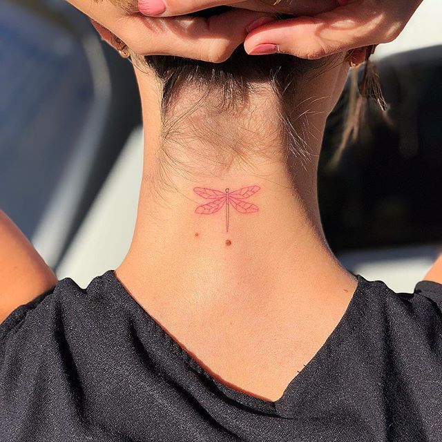 dragonfly neck tattoo