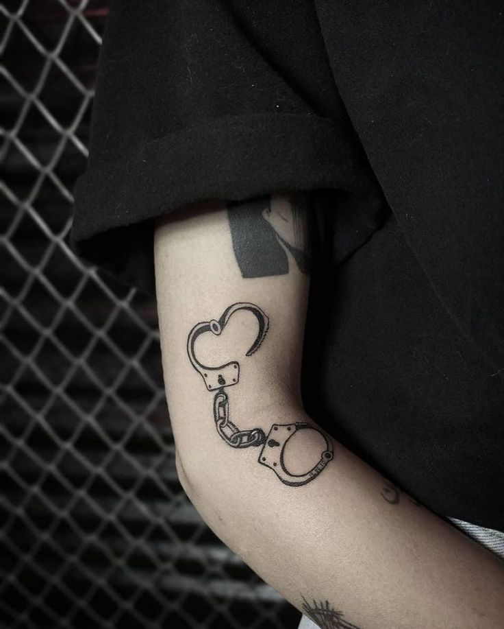 handcuff tattoo