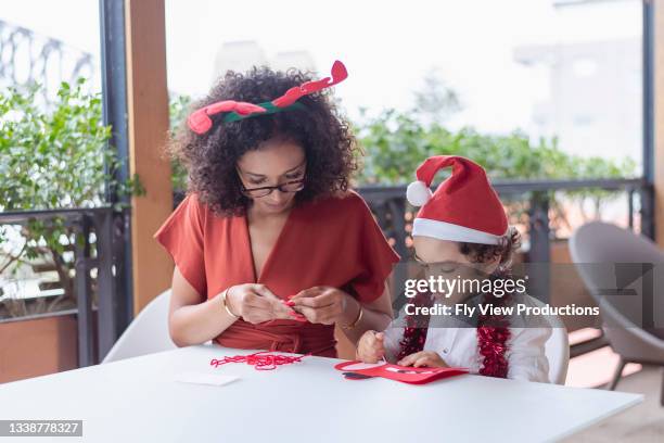 mom helps son with project