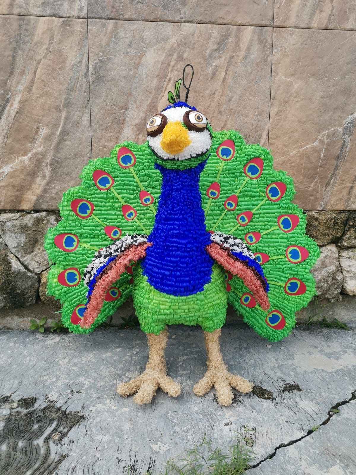 piñata de pavo real