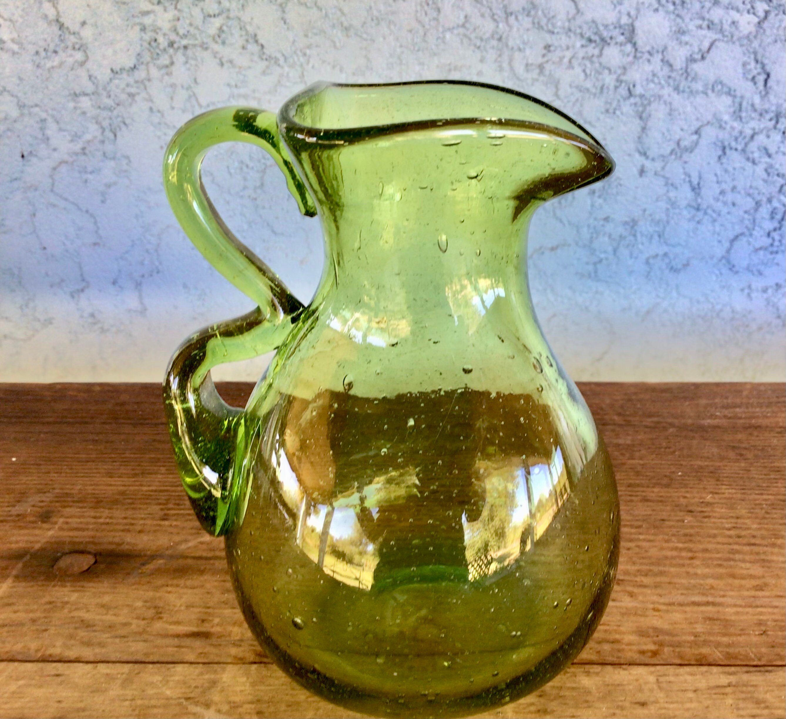 hand blown green glass pitcher