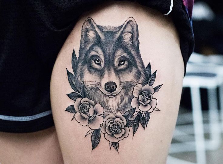 tatuajes de lobo para mujer en la pierna