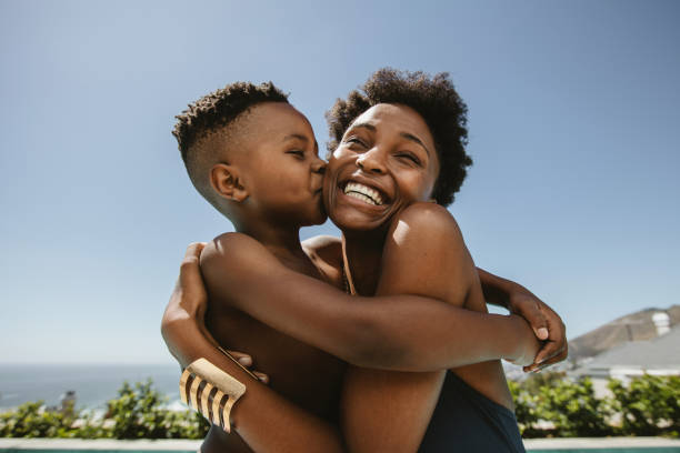 kissing mom and son