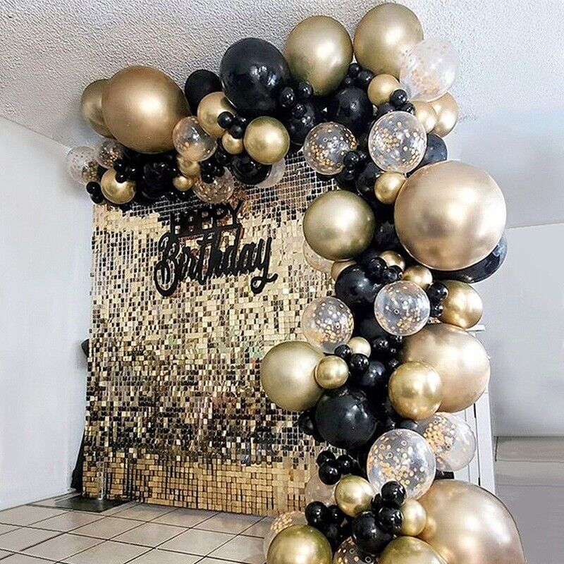 black and gold balloon arch