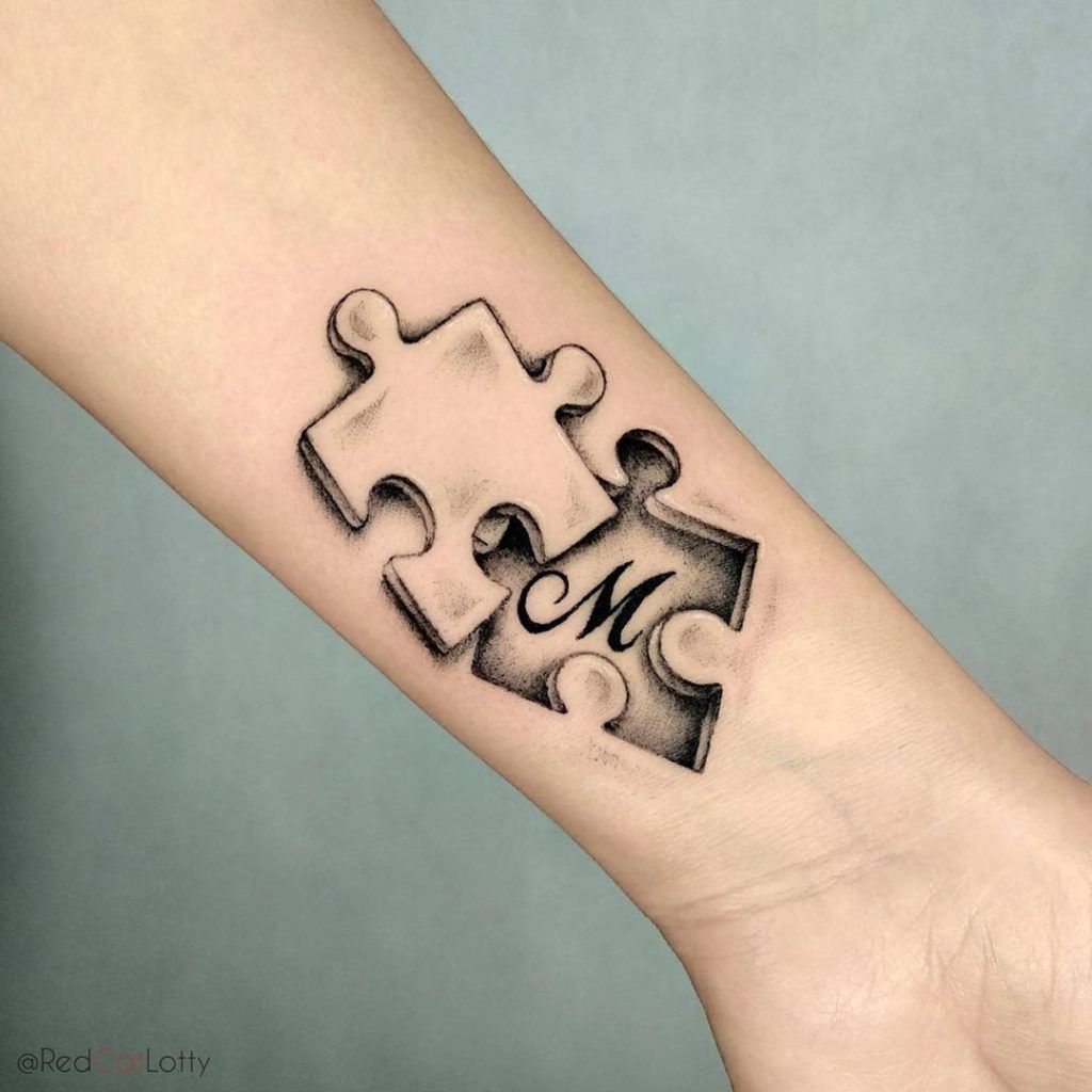 meaningful puzzle piece tattoo