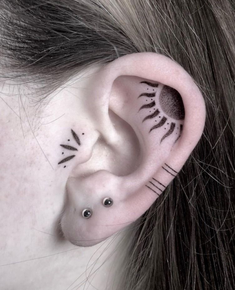 sun ear tattoo