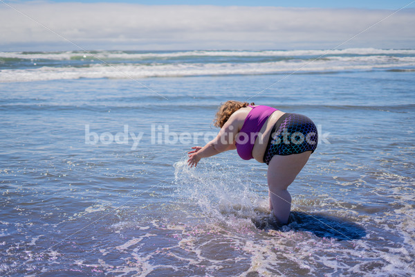 fat lady on a beach