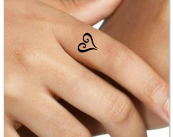 love heart tattoo finger