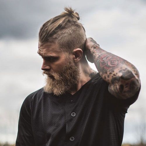 man bun hairstyle with beard