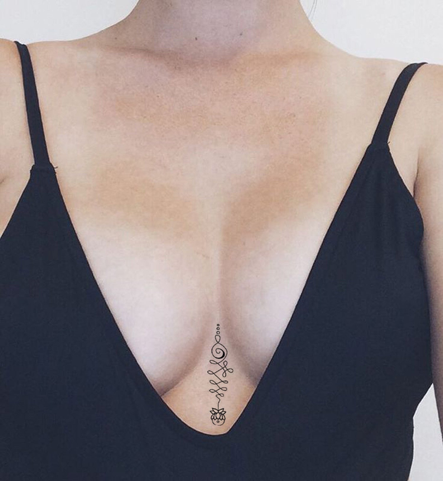 sternum tattoo small