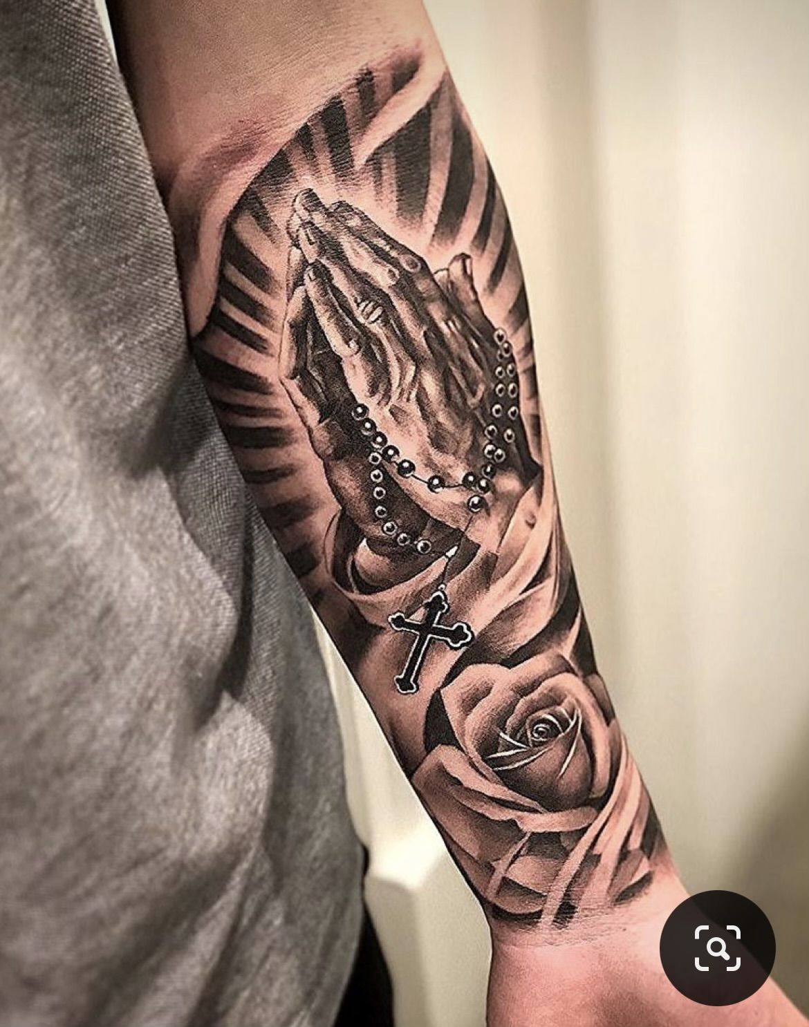 prayer hands tattoo sleeve