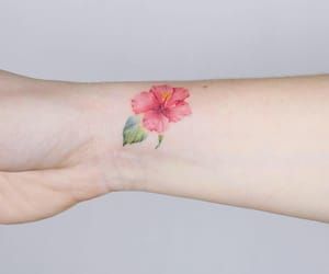 hibiscus wrist tattoo