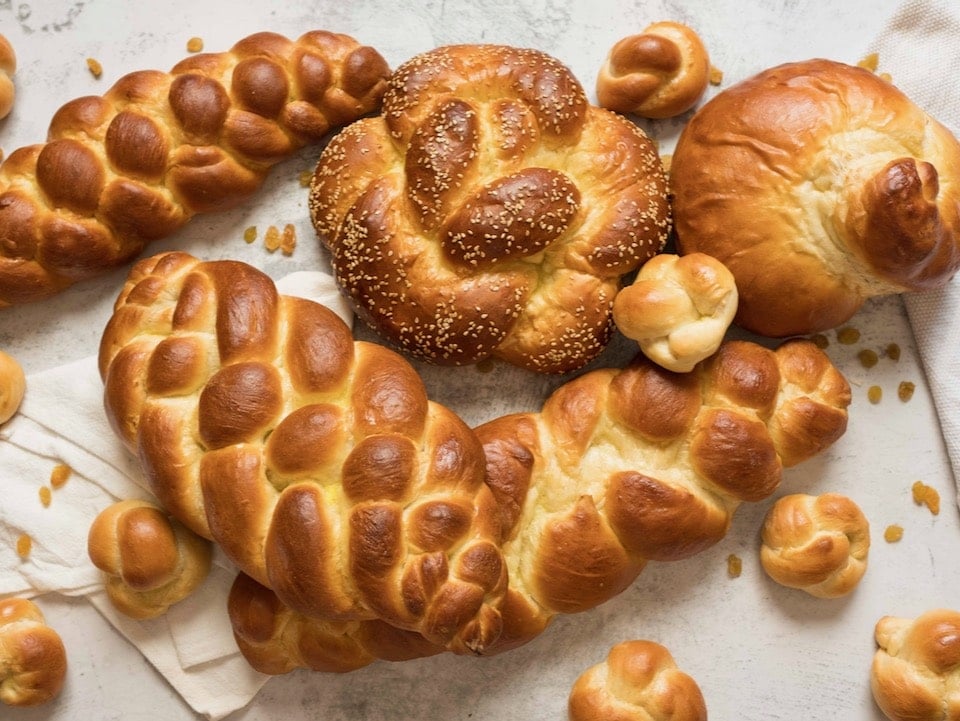 challah braids crossword clue