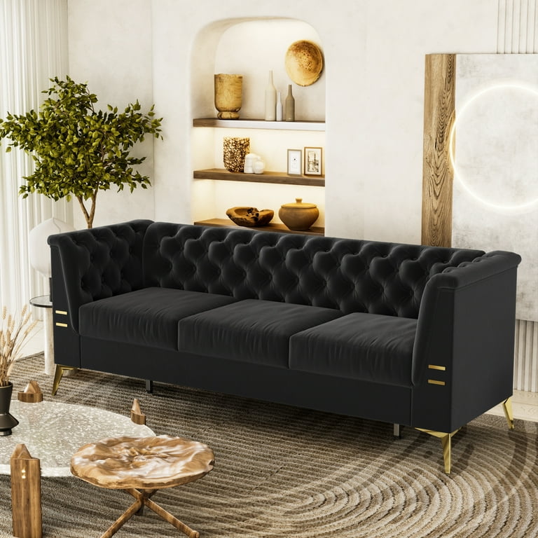 black velvet tufted sofa