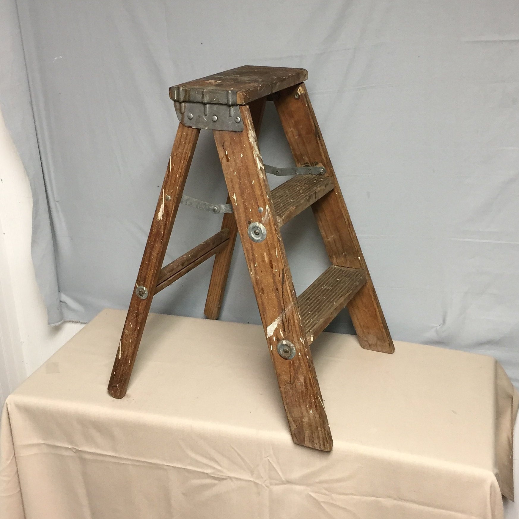 small wooden step ladder