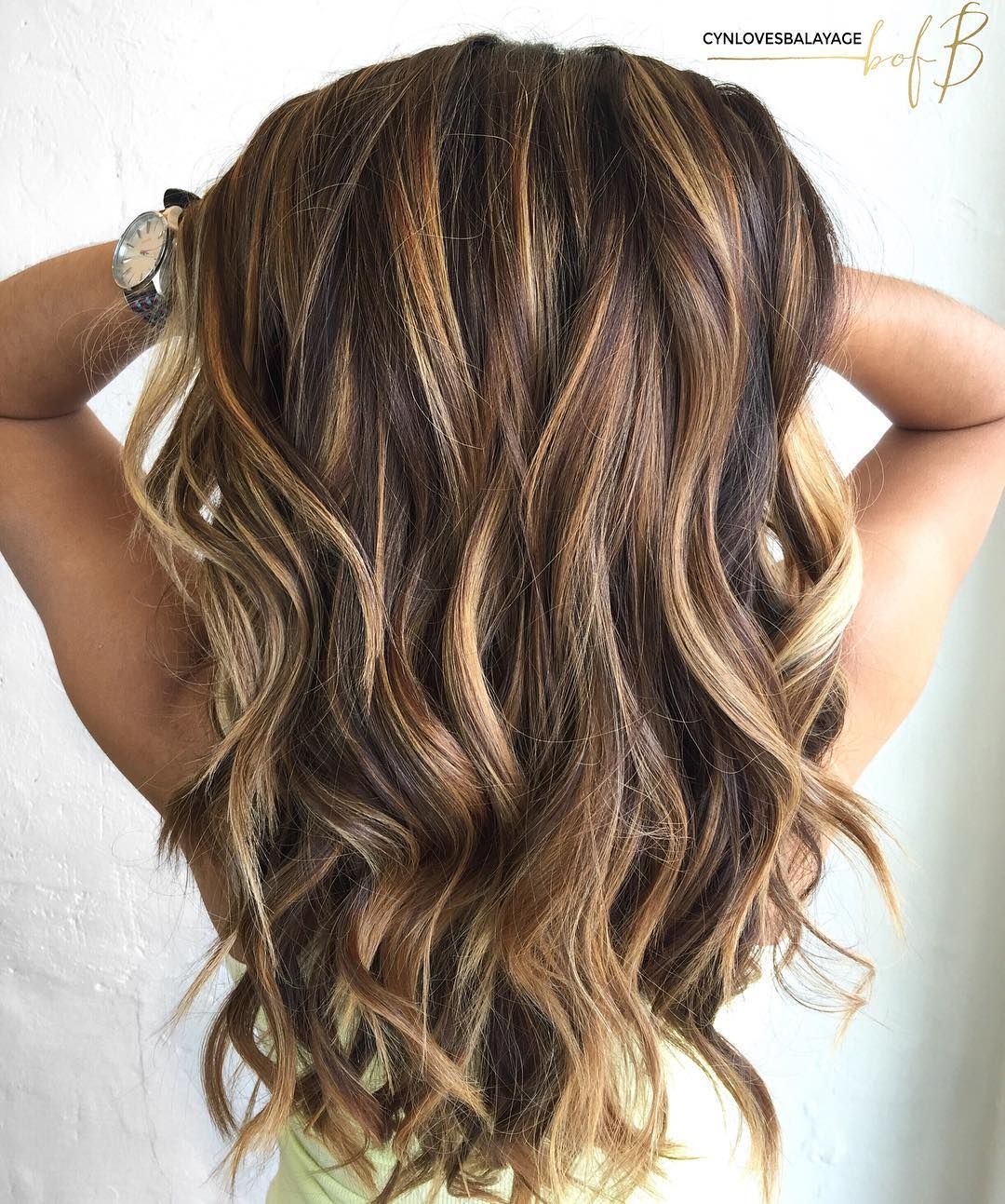 dark brown hair with caramel highlights