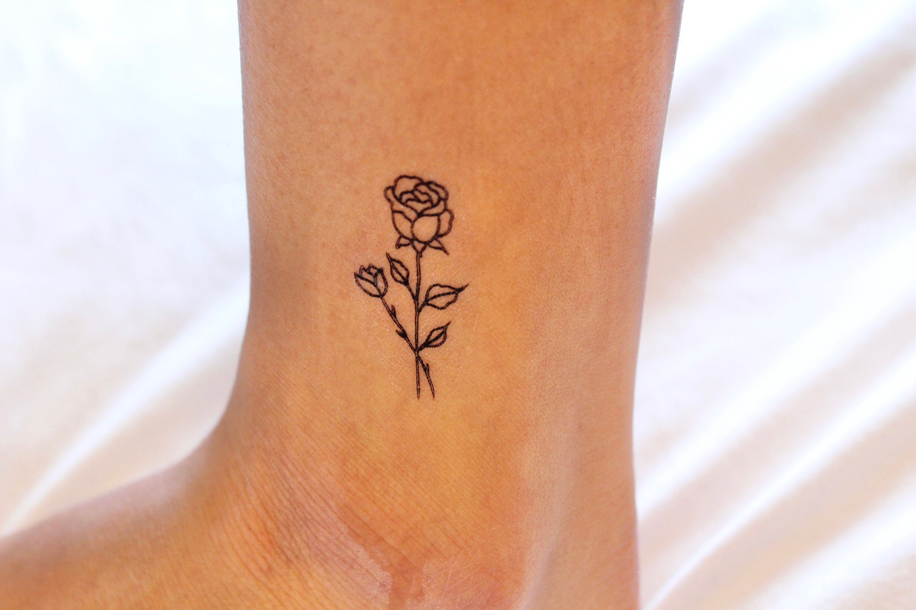 kleines tattoo rose