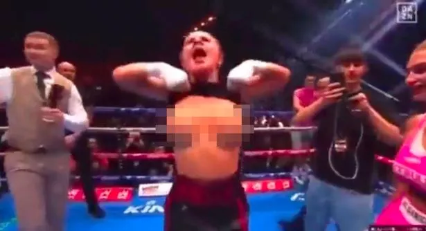 female boxer flashes boobs