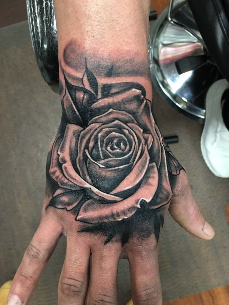 rose hand tattoo men