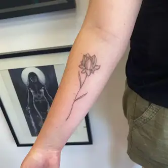 simple water lily tattoo