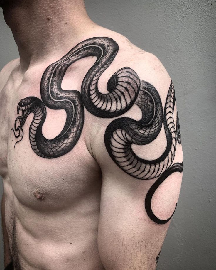 snake chest tattoo