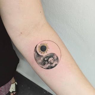 yin yang sol y luna tatuaje